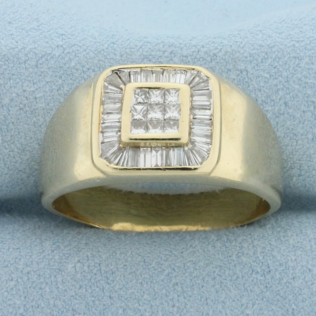 Mens Invisible Set Diamond Ring in 10k Yellow Gold: In 10k Yellow Gold. Contains nine princess cut and thirty-two baguette high quality diamonds 3/4ct TW, SI clarity/H color. 12.4mm wide at top of ring. Size 15. 11.6g.