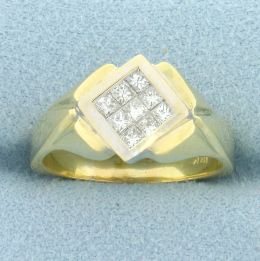 Designer Princess Diamond Ring in 18k Yellow Gold: In 18k yellow gold. Contains nine princess cut diamonds, 1/2ct TW, VS clarity/G color. Invisible set diamonds to look like one massive 2ct diamond. Size 8. 7.7g.