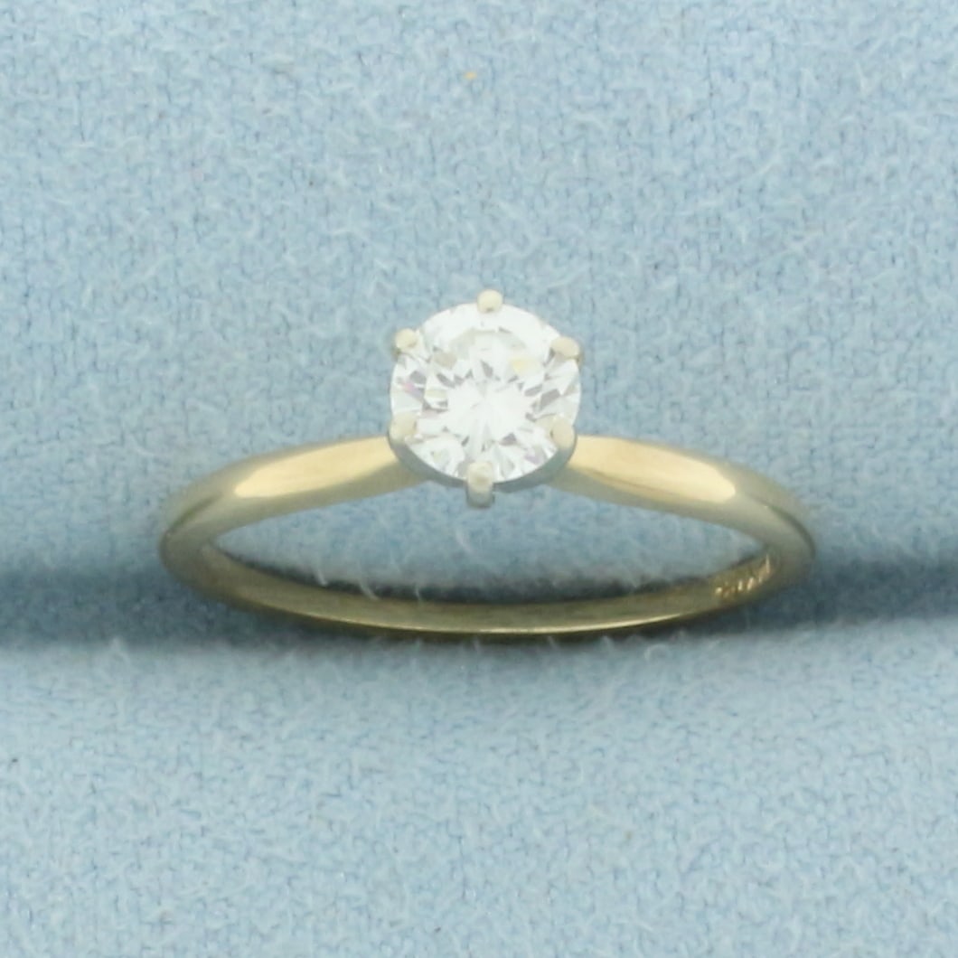 Solitaire Diamond Engagement Ring in 14k Yellow Gold: In 14k yellow gold. Contains one high quality round brilliant cut 1/2ct Diamond, VS clarity/G color, great cut for lots of sparkle. Size 6. 1.6g.