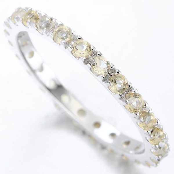 Citrine Eternity Stacking Band Ring in Sterling Silver: In platinum over .925 sterling silver. Contains 30 genuine citrine gemstones with light yellow color, 0.9ctw. Size 7. 1.6g