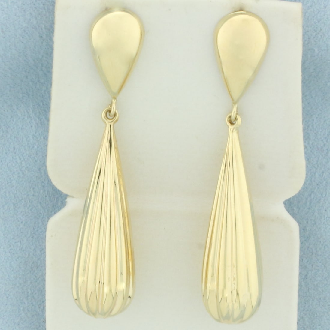 Teardrop Dangle Drop Earrings in 14k Yellow Gold: In 14k Yellow Gold. 2 1/8 inches long. Friction backs. 5.0g.