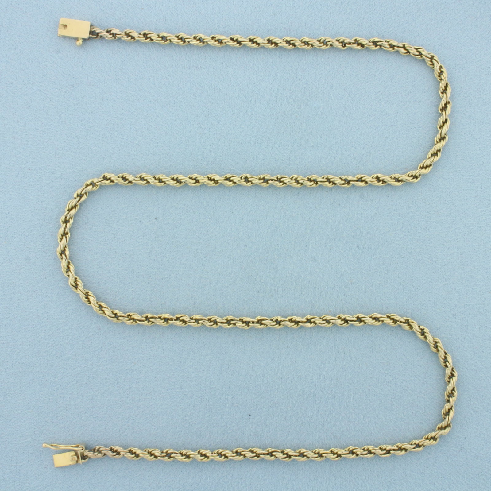 19 Inch Rope Link Chain Necklace in 10k Yellow Gold: In _k Yellow Gold. 19 inches long. 3.3mm wide. Slide clasp with safety latch. 18.6g.