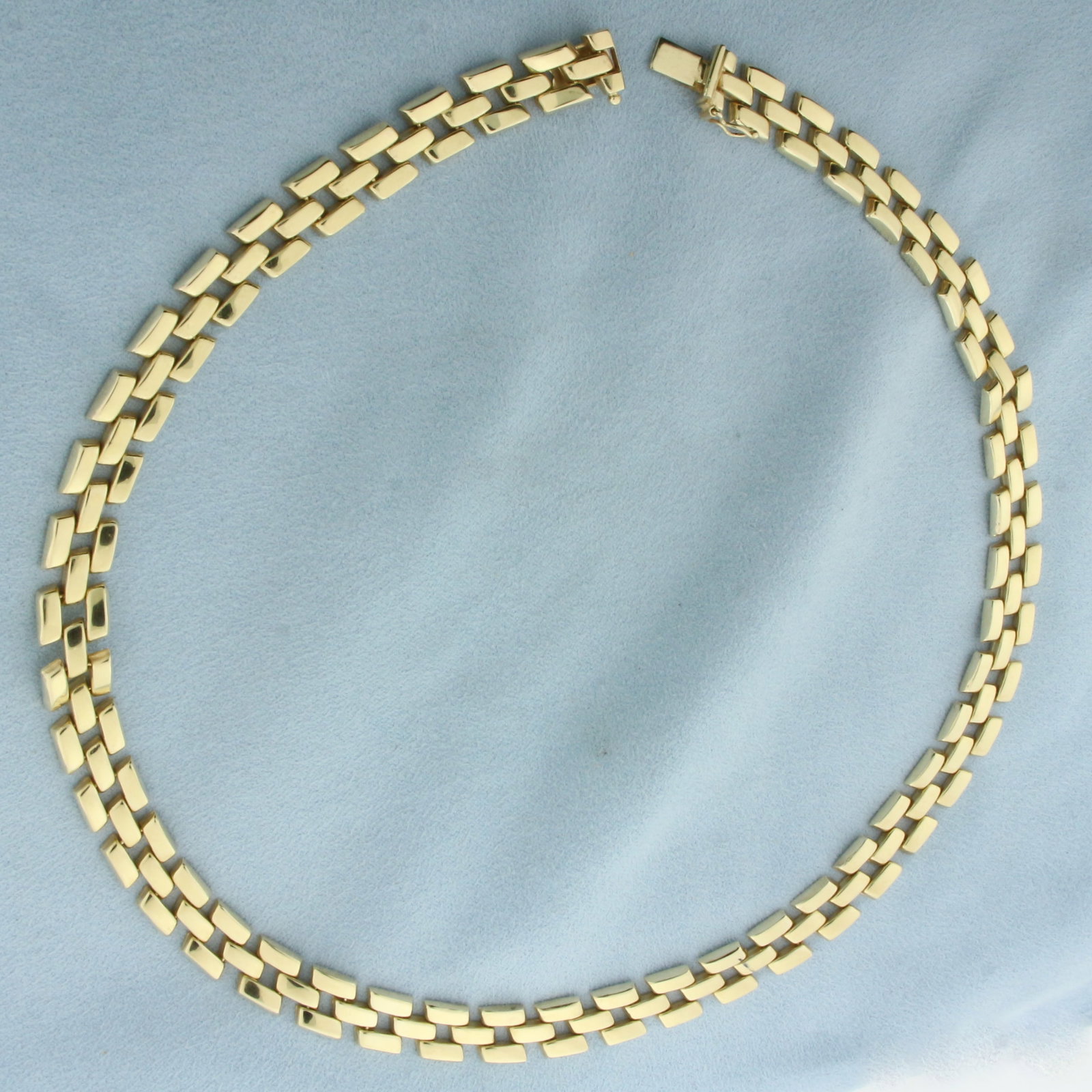 Italian 18 Inch Panther Link Necklace in 14k Yellow Gold: In 14k Yellow Gold. 18 inches long. 3/8 inch wide. Italian made. Concealed slide clasp with safety latch. 44.9g.