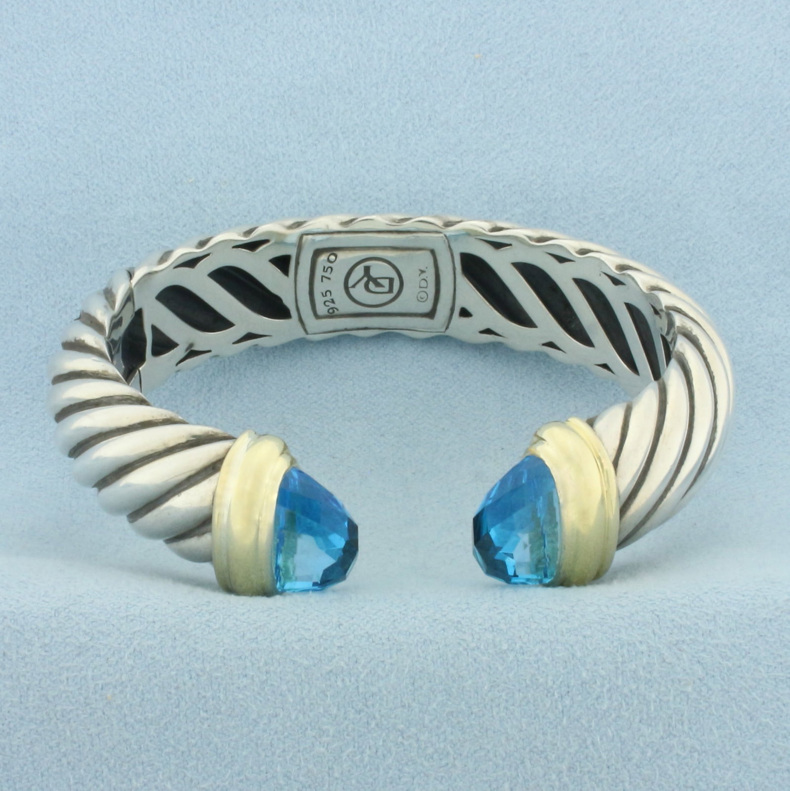 David Yurman Wide 15mm Waverly Blue Topaz Hinged Cuff Bracelet in Sterling Silver and 18k Yellow: In .925 Sterling Silver and 18k Yellow Gold. Interior dimensions: 2 1/4 inch by 1 3/4 inch. Hinged for easy on/off.