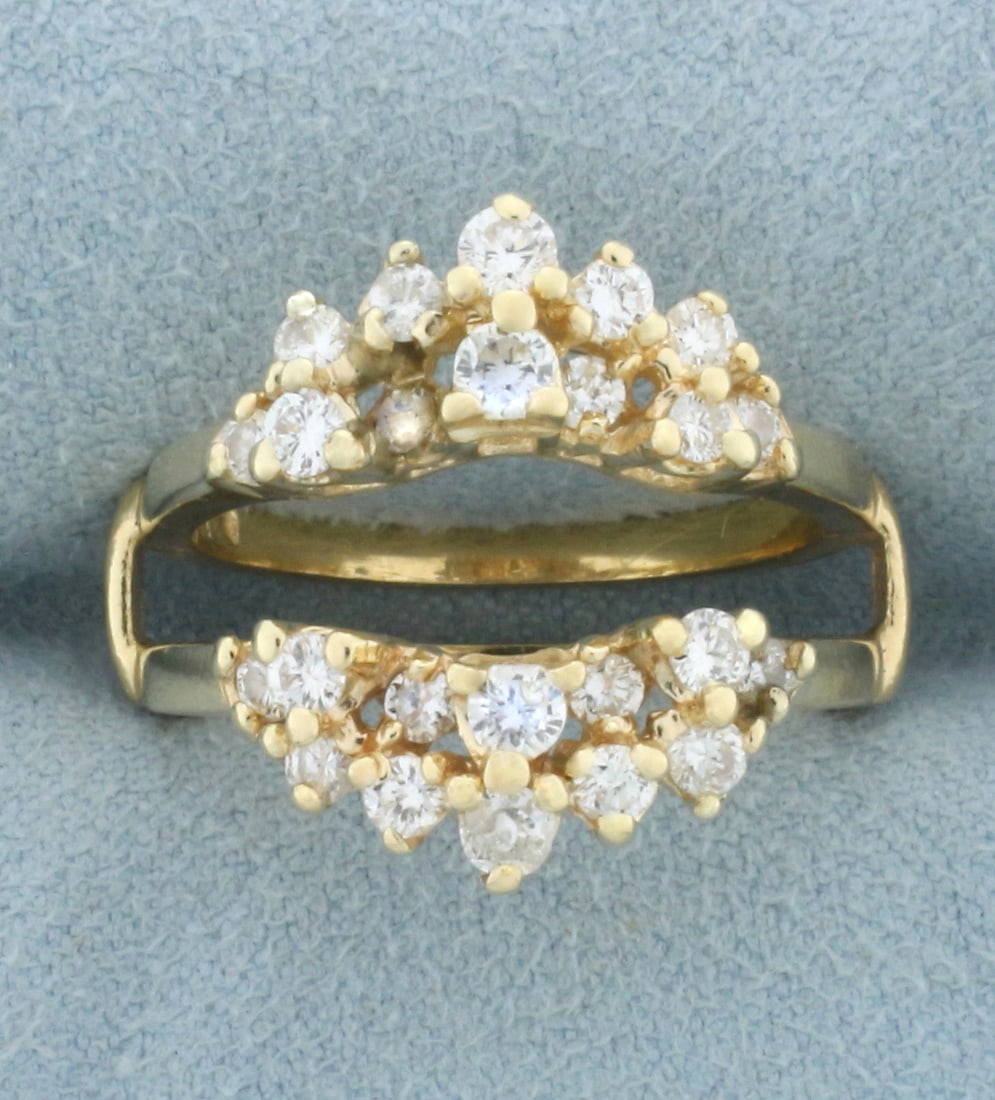 Diamond Ring Jacket in 14k Yellow Gold: In 14k yellow gold. Contains twenty four high quality diamonds, 1ct TW, SI1 clarity/H color. 6mm between rings. Size: 6.5. 6.5g.