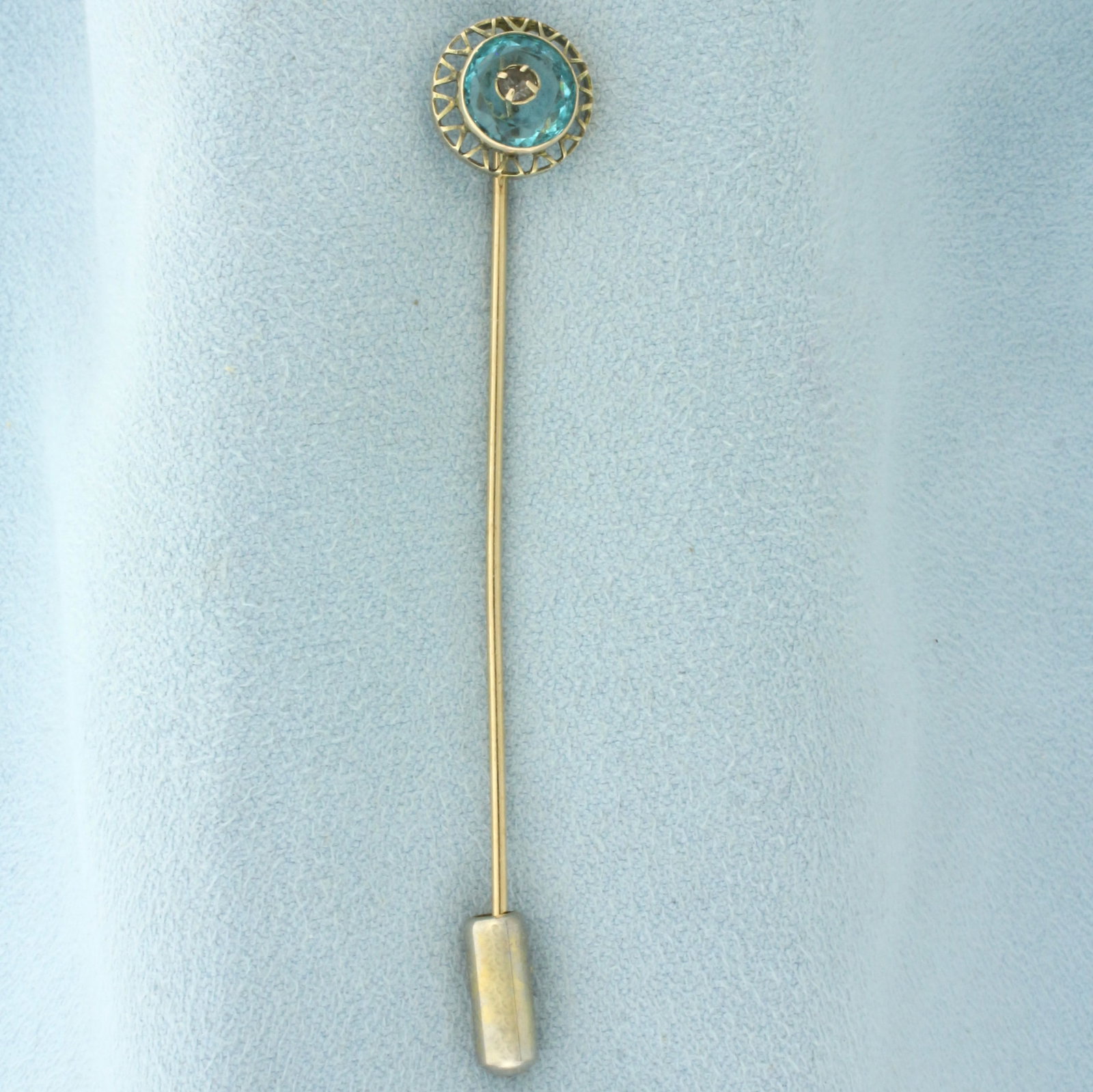Antique Aquamarine and Diamond Stick Pin in 14k Yellow Gold: In 14k yellow gold. Contains one 7.3mm high quality natural Aquamarine gemstone, approximately 1ct, with vibrant color and excellent clarity. Also contains one high quality .03ct Old European Cut