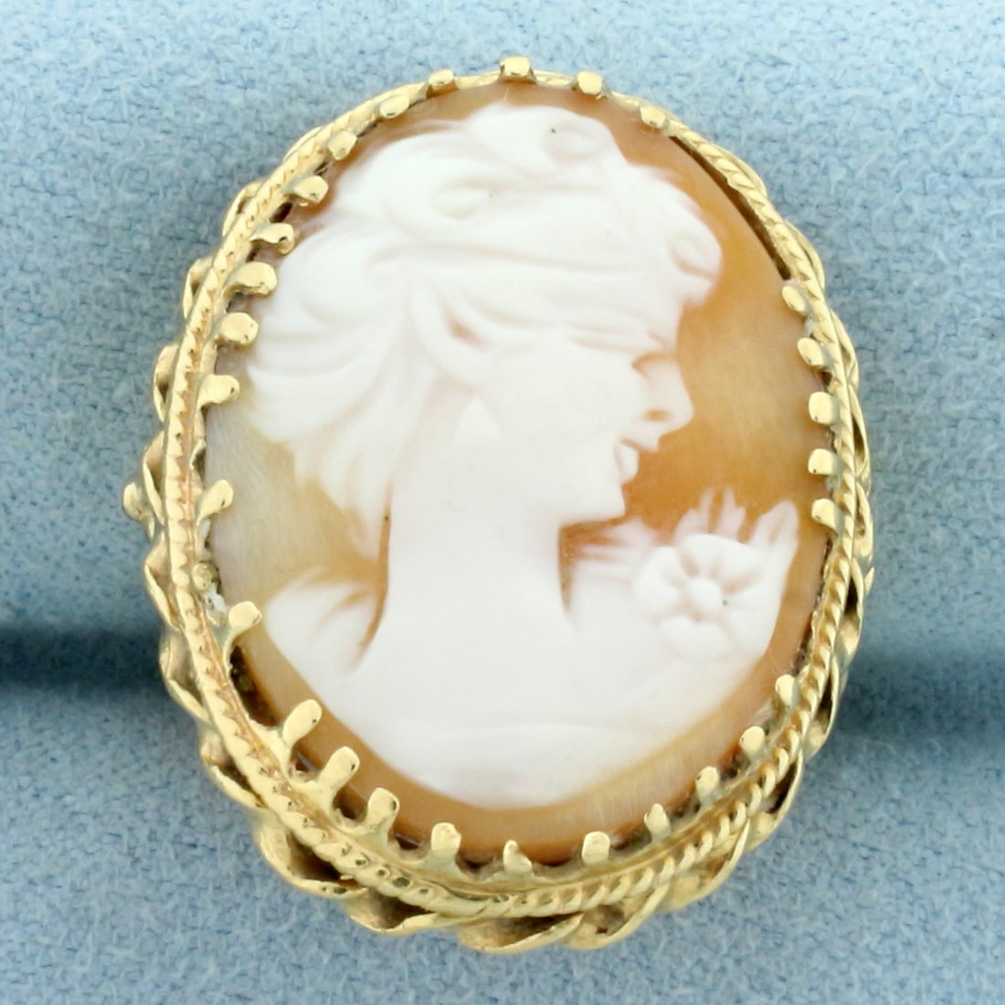 Large Vintage Shell Cameo Ring in 14k Yellow Gold: In 14k yellow gold. Contains a 25mm by 120mm hand carved Cameo. Size: 6. 10.4g.