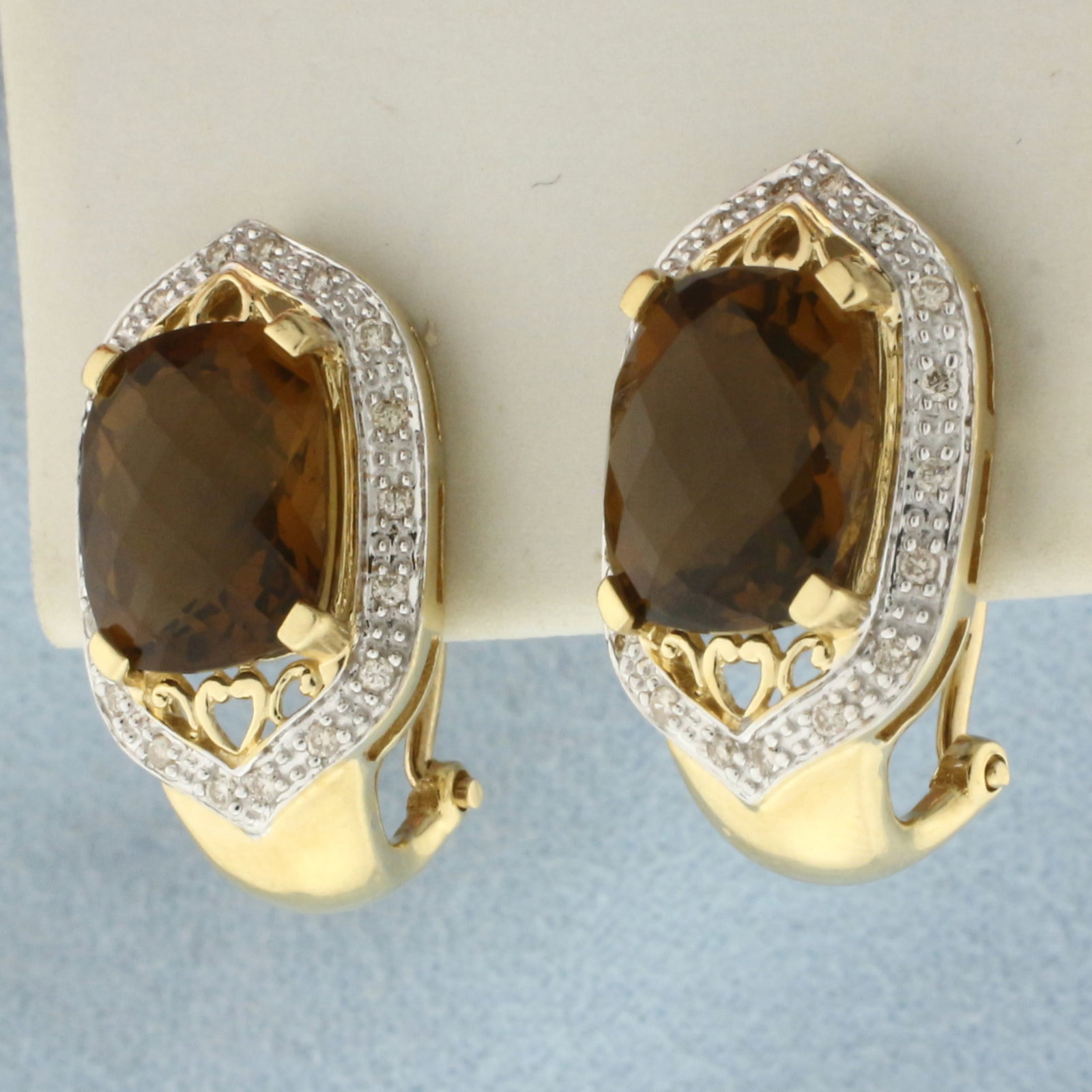 Checkerboard Cut Citrine and Diamond Earrings in 14k Yellow Gold: In 14k Yellow Gold. Contains two high quality natural 11mmx9mm cushion checkerboard cut Citrine gemstones with intense color and excellent clarity. Also contains thirty-six half point diamonds. 7/8 in
