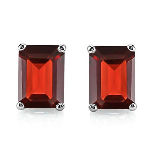 5x7 Emerald Cut Garnet Earrings in Sterling Silver: In platinum over .925 sterling silver basket mountings with friction backs included. Contains 2 emerald cut Garnet gemstones with excellent color and clarity, approx. 3.4CTW, 5x7mm each. 1.8g