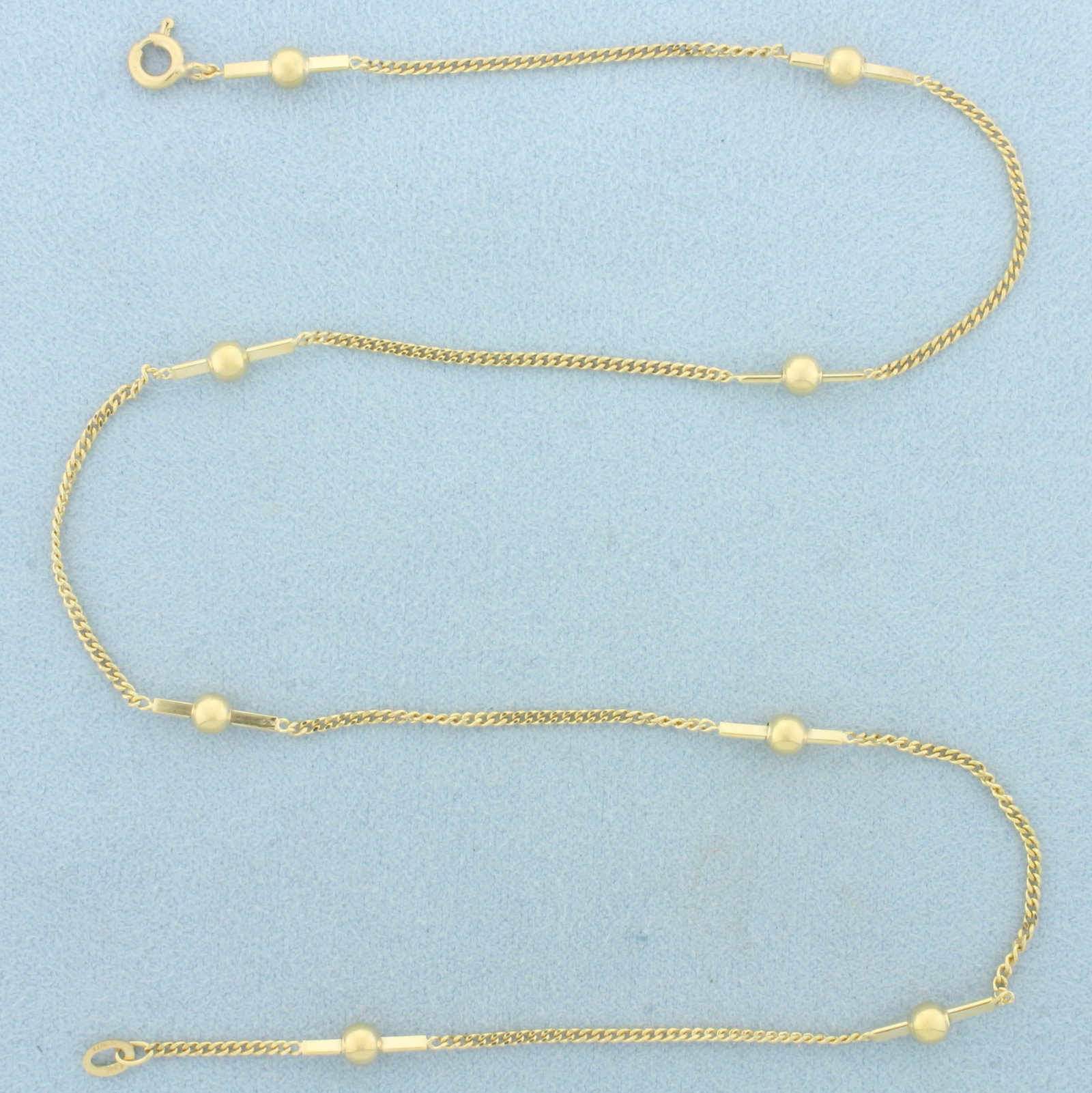 Ball Bead Curb Link Station Choker Necklace in 14k Yellow Gold: In 14k Yellow Gold. 15 1/2 inches long. 1.5mm wide curb link chain. 3mm ball beads. 4.3g.