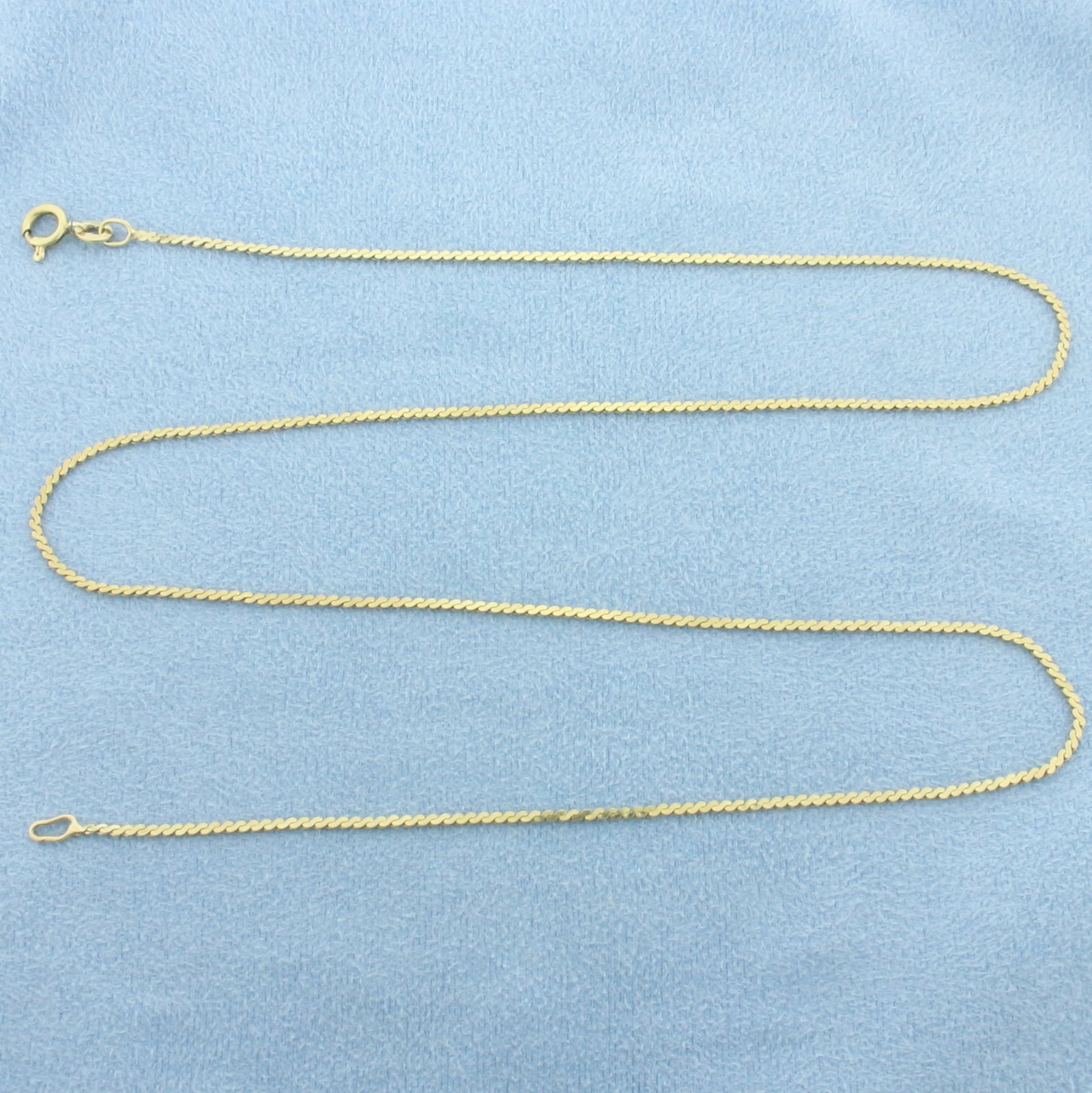 Italian 20 Inch S-Link Chain Necklace in 14k Yellow Gold: In 14k Yellow Gold. 20 inches long. 1.2mm wide. Made in Italy. Spring clasp. 3.6g.