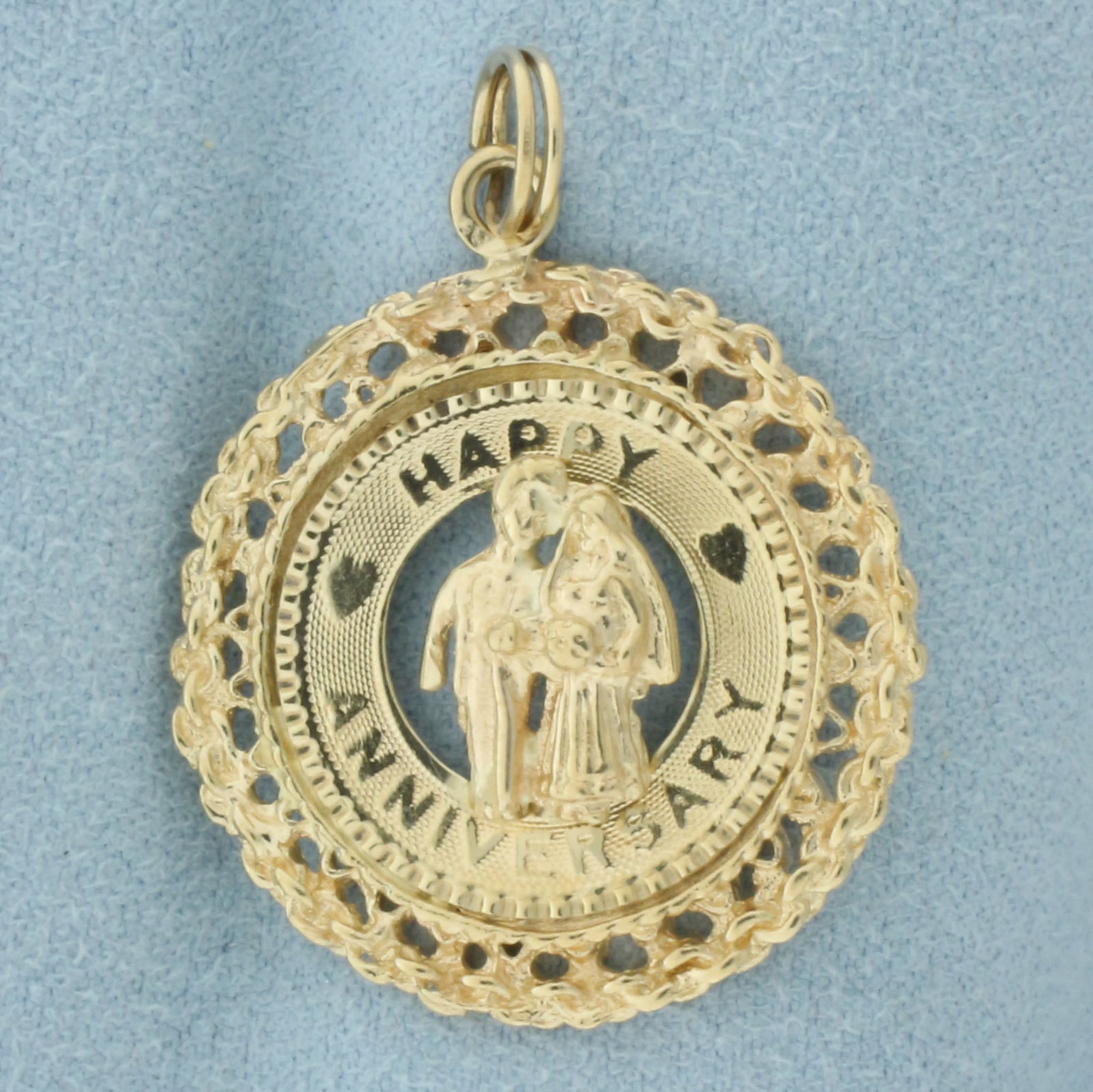 Happy Anniversary Charm or Pendant in 14k Yellow Gold: In 14k Yellow Gold. 1 3/8 inch long. 1 inch wide. Split ring for easy attachment. 4.8g.