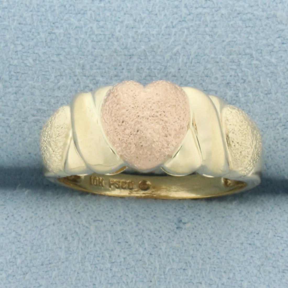 Puffy Heart Ring in 10k Yellow and Rose Gold: In 10k Yellow and Rose Gold. 8mm wide. Size 7. 3.9g.