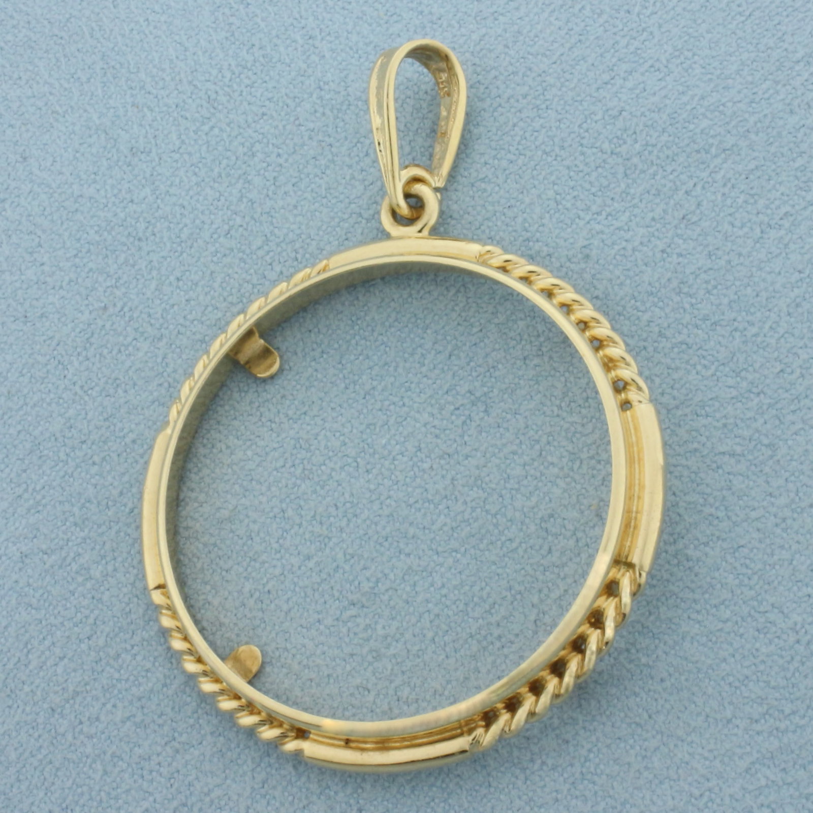 34mm Double Eagle Gold Coin Bezel Pendant in 14k Yellow Gold: In 14k Yellow Gold. 2 inches long (including bale). 1 3/8 inch wide. Can hold any 34mm gold coin like a $20 Liberty Head or Saint Gaudens. 6.2g.