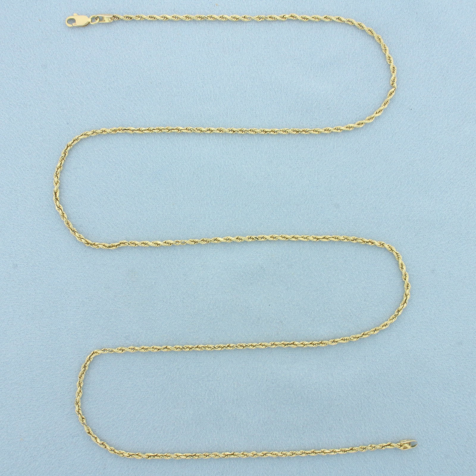 24 Inch Rope Link Chain Necklace in 14k Yellow Gold: In 14k Yellow Gold. 24 inches long. 2mm wide. Lobster clasp. 7.8g.