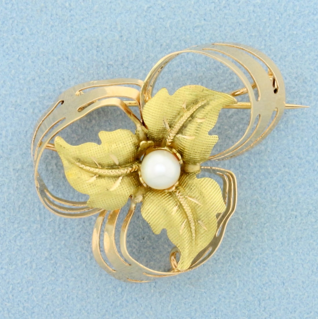 Vintage Hand Crafted Pearl Leaf Pin Brooch in 18K Yellow and Rose Gold: In 18K Yellow and Rose Gold. Leaf in yellow gold, surrounding loops in rose gold. Contains one high quality natural 4.7mm Cultured Pearl. 1 1/4 inches long, 1 1/2 inches wide. 5.3g.