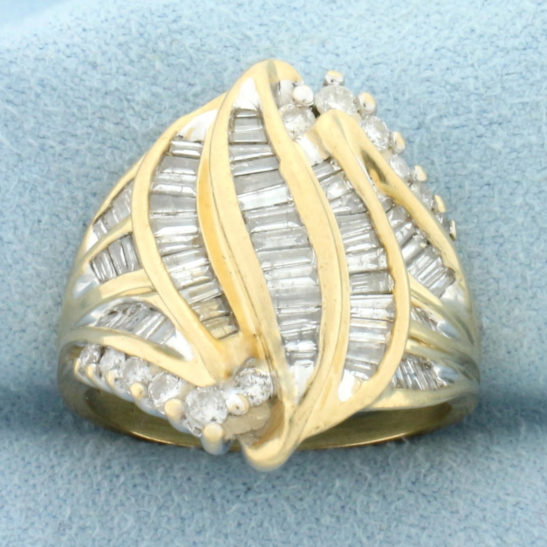 Designer Baguette and Round Diamond Statement Ring in 14k Yellow Gold: In 14k yellow gold. Contains twelve round and sixty baguette high quality diamonds, 2ct TW, SI clarity/G color. Size 8. 9.9g.