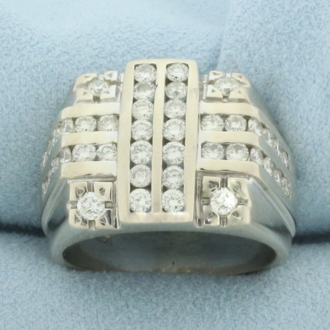 Mens Channel Set Diamond Statement Ring in 14k White Gold: In 14k white gold. Contains forty two high quality diamonds, 2ct TW, SI clarity/H color. Approx. 17.5mm wide at widest point. Size 11.5. 15.7g.