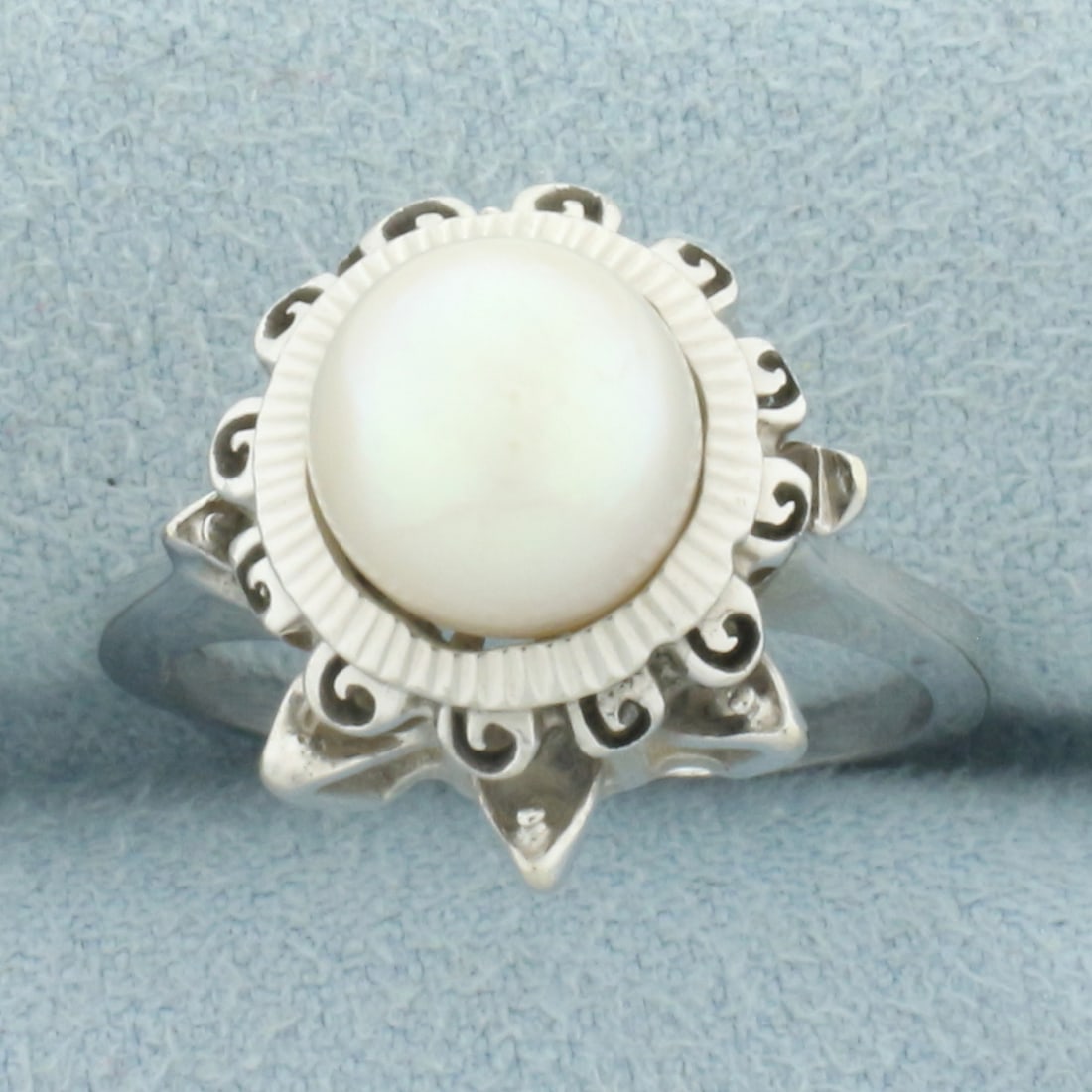Vintage Cultured Akoya Pearl Crown Ring in 14k White Gold: In 14k white gold. Contains one high quality 8mm Cultured Akoya Pearl with very high luster and beautiful color. High profile for maximum impact. Size: 7. 6.0g.
