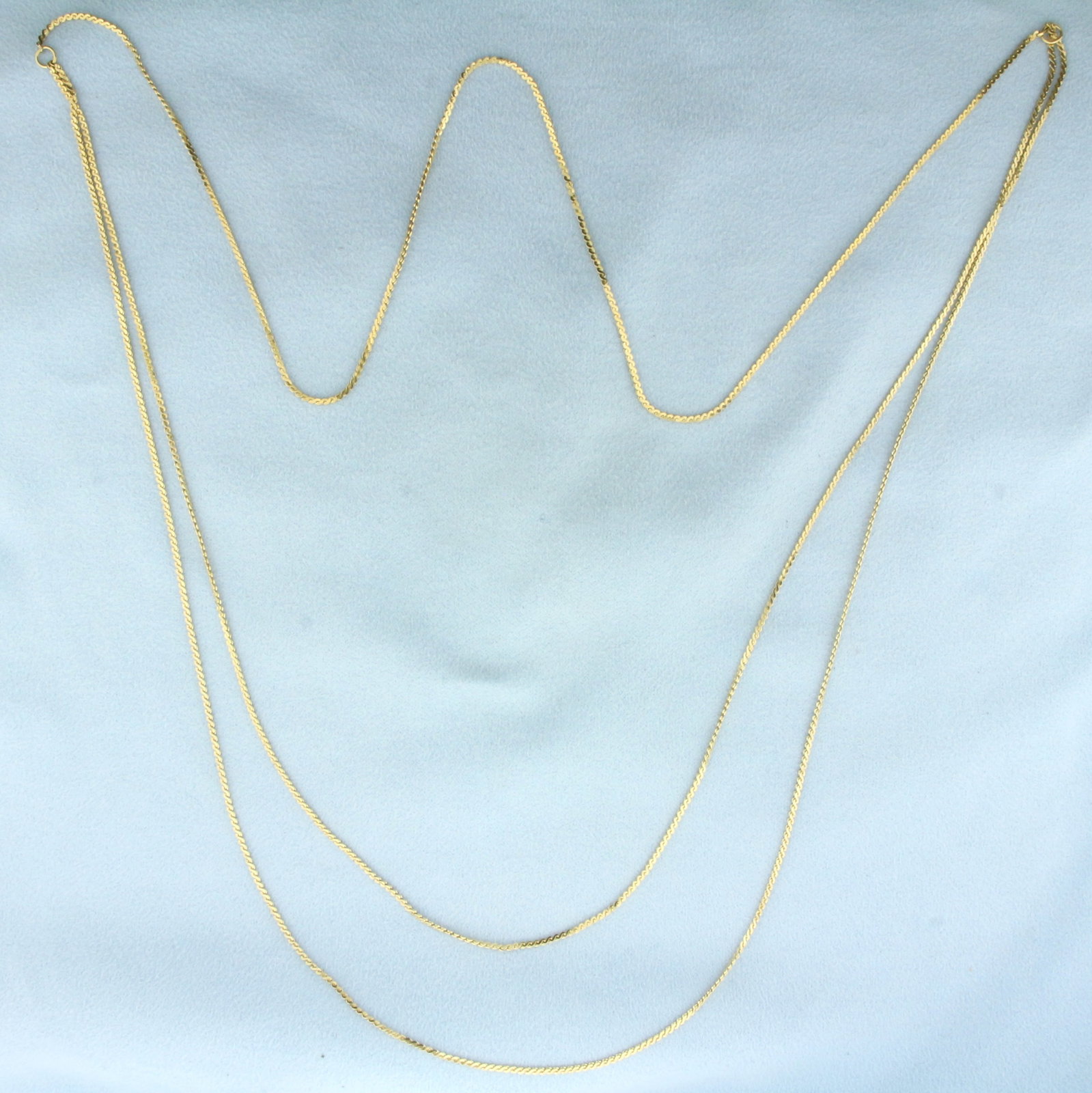 Long Double Strand S-Link Chain Necklace in 14k Yellow Gold: In 14k Yellow Gold. Shorter strand is 32 inches long, longer 33 inches. 1.2mm wide. 6.7g.