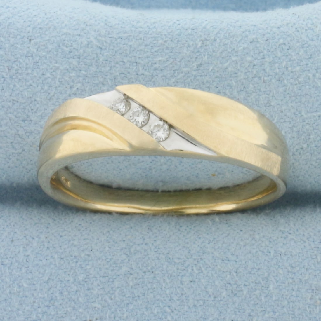 Mens Three Stone Diagonal Diamond Wedding Band Ring in 10k Yellow Gold: In 10k Yellow Gold. Contains three high quality .04ct diamonds, 1/8ct TW, SI clarity/G color. 6.8mm wide at center. Size 14. 8.2g.