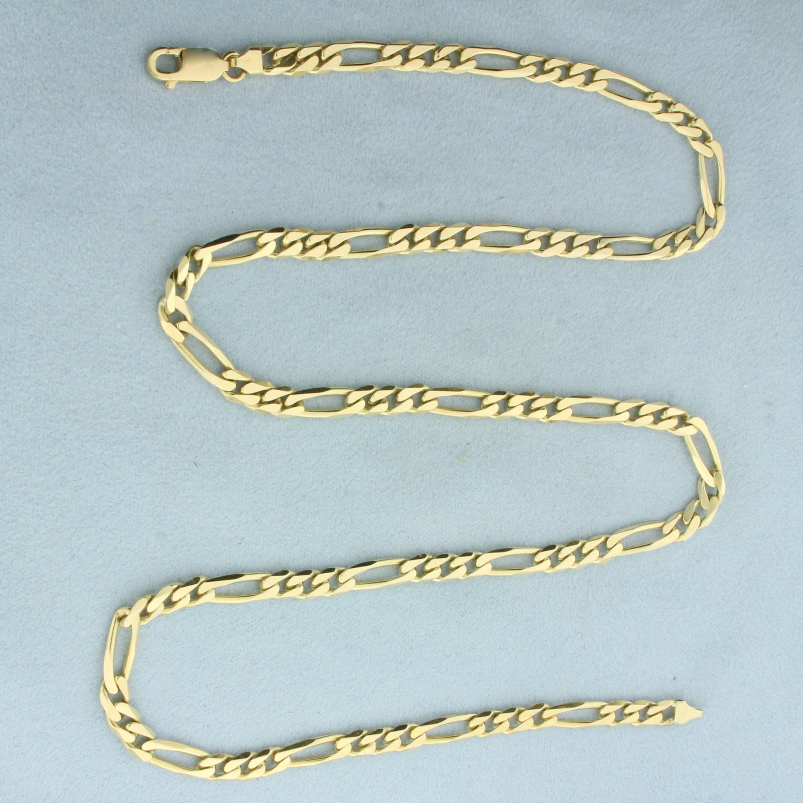 Italian 24 Inch Figaro Link Chain Necklace in 14k Yellow Gold: In 14k Yellow Gold. 24 inches long. 5.3mm wide. Made in Italy. Lobster clasp. 34.8g.