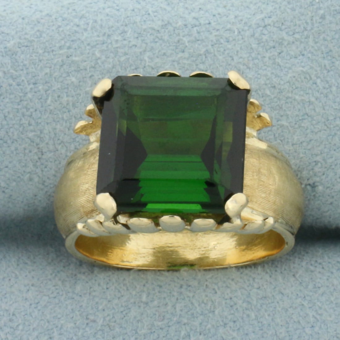 AAA Green Tourmaline Ring in 18k Yellow Gold: In 18k Yellow Gold. Contains one 11mm AAA quality square emerald cut natural Green Tourmaline gemstone, approximately 9cts, with intense chrome green color and excellent clarity. Size 6.5. 6.9g.