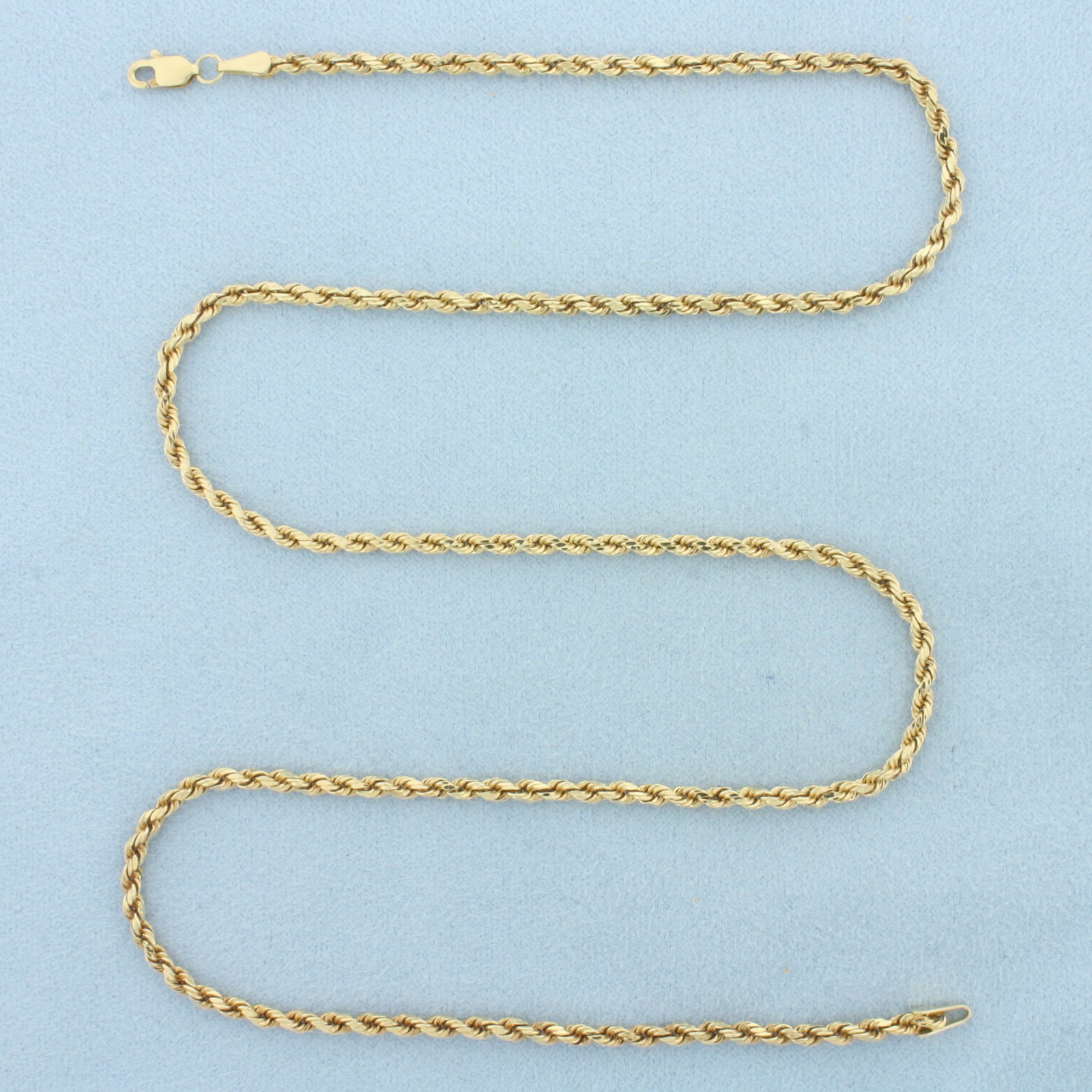 20 Inch Rope Link Chain Necklace in 14k Yellow Gold: In 14k Yellow Gold. 20 inches long. 2.3mm wide. Lobster clasp. 3.8g.