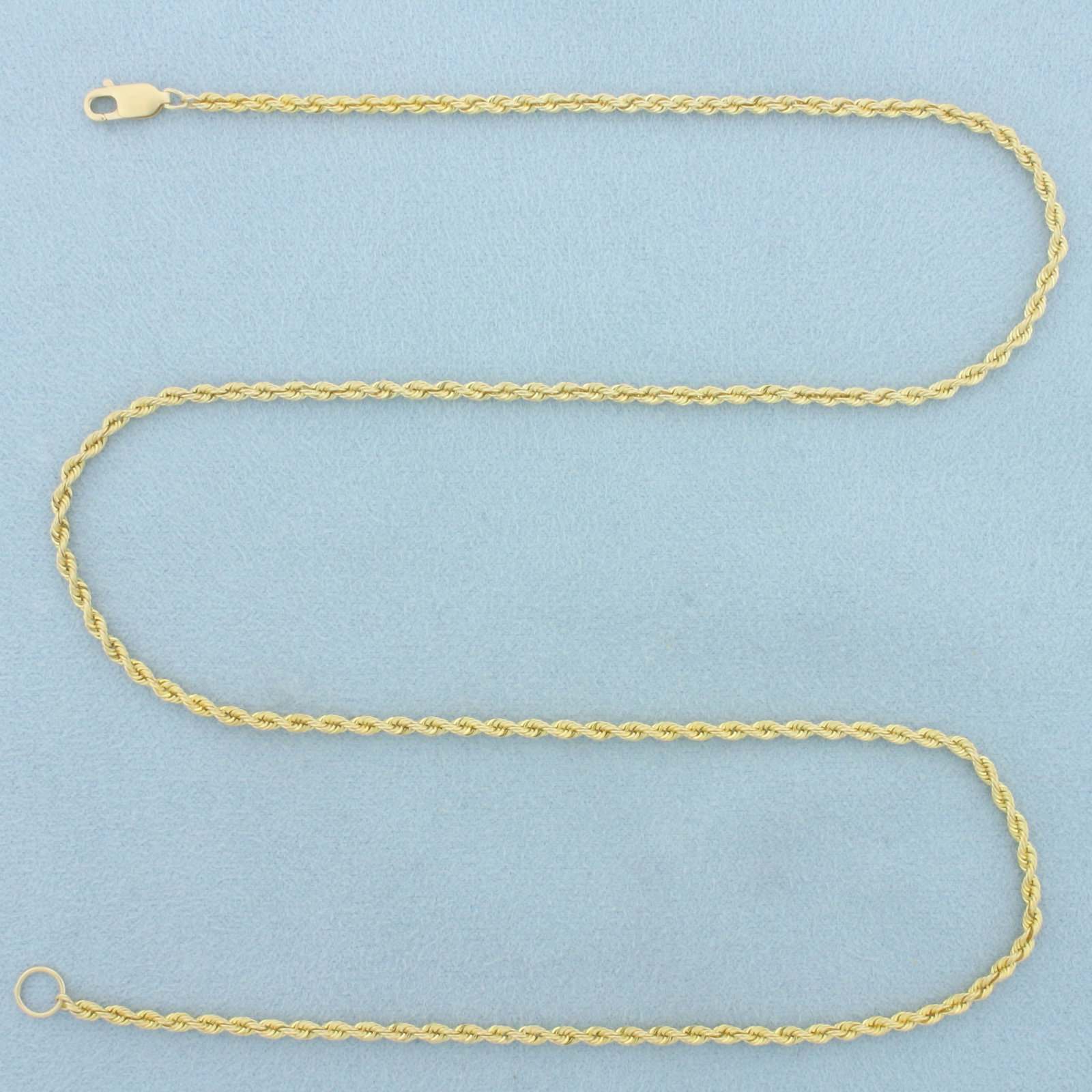 20 Inch Rope Link Chain Necklace in 14k Yellow Gold: In 14k Yellow Gold. 20 inches long. 2.25mm wide. Lobster clasp. 8.7g.