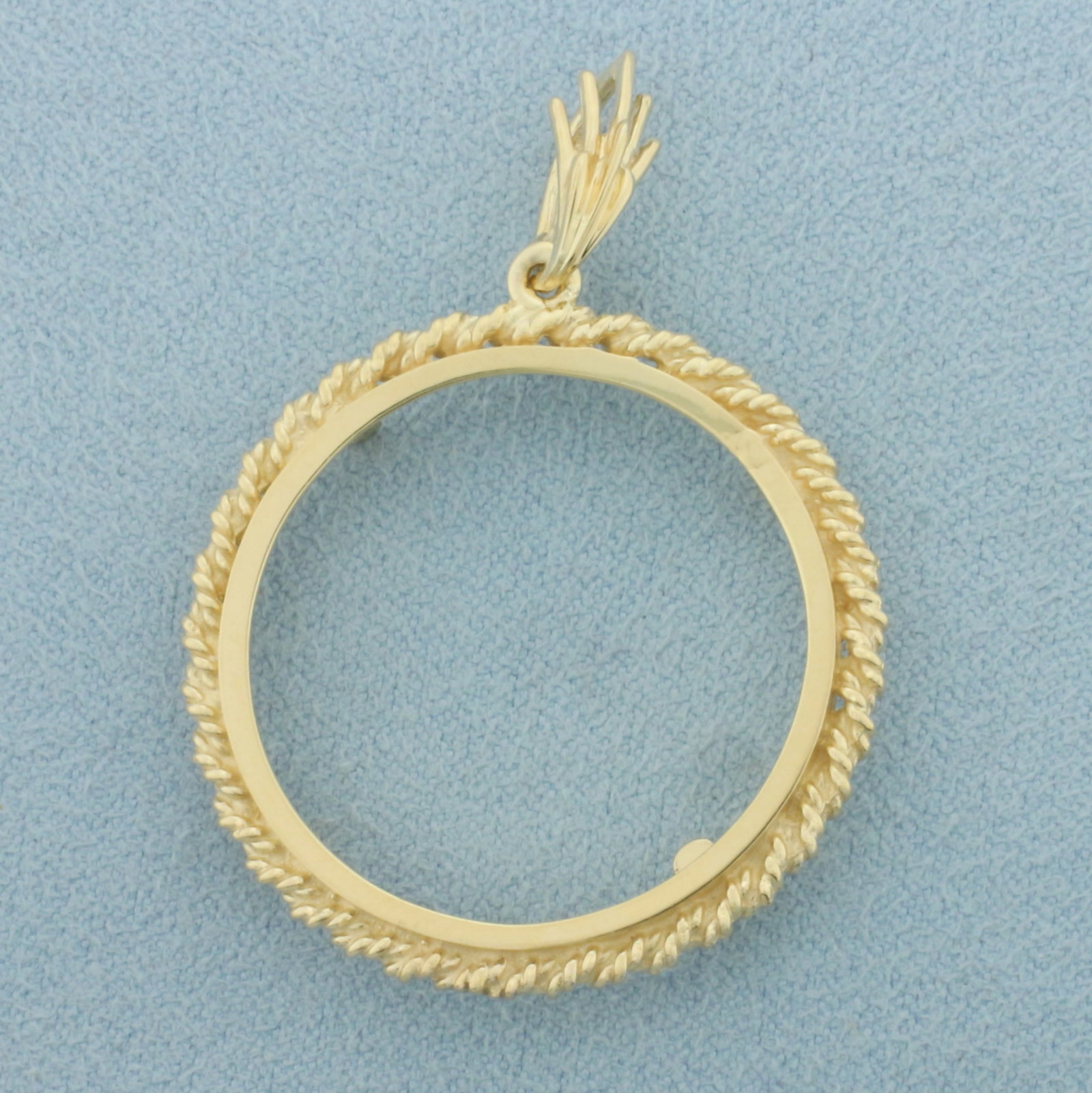 27mm 1/2oz Gold Eagle Coin Bezel Pendant in 14k Yellow Gold: In 14k Yellow Gold. 1 1/4 inch long. Made for any 27mm gold coin like 1/2oz American Eagle Gold Coin. 5.4g.