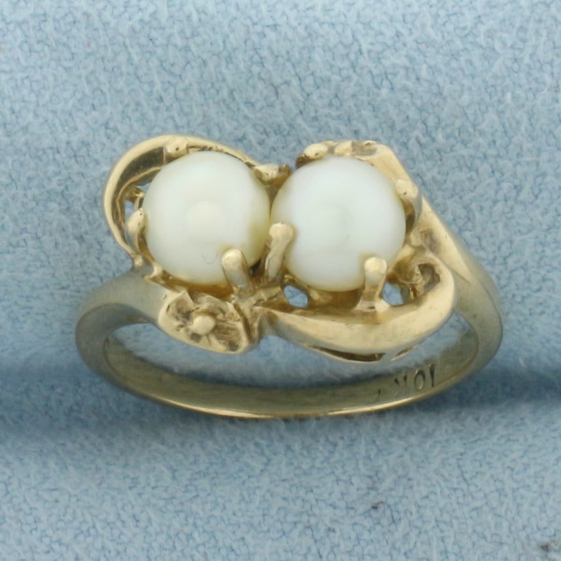 Cultured Akoya Pearl Toi et Moi Ring in 10k Yellow Gold: In 10k Yellow Gold. Contains two 5.7mm high quality Cultured Akoya Pearls with high luster. Size 6.5. 3.2g.