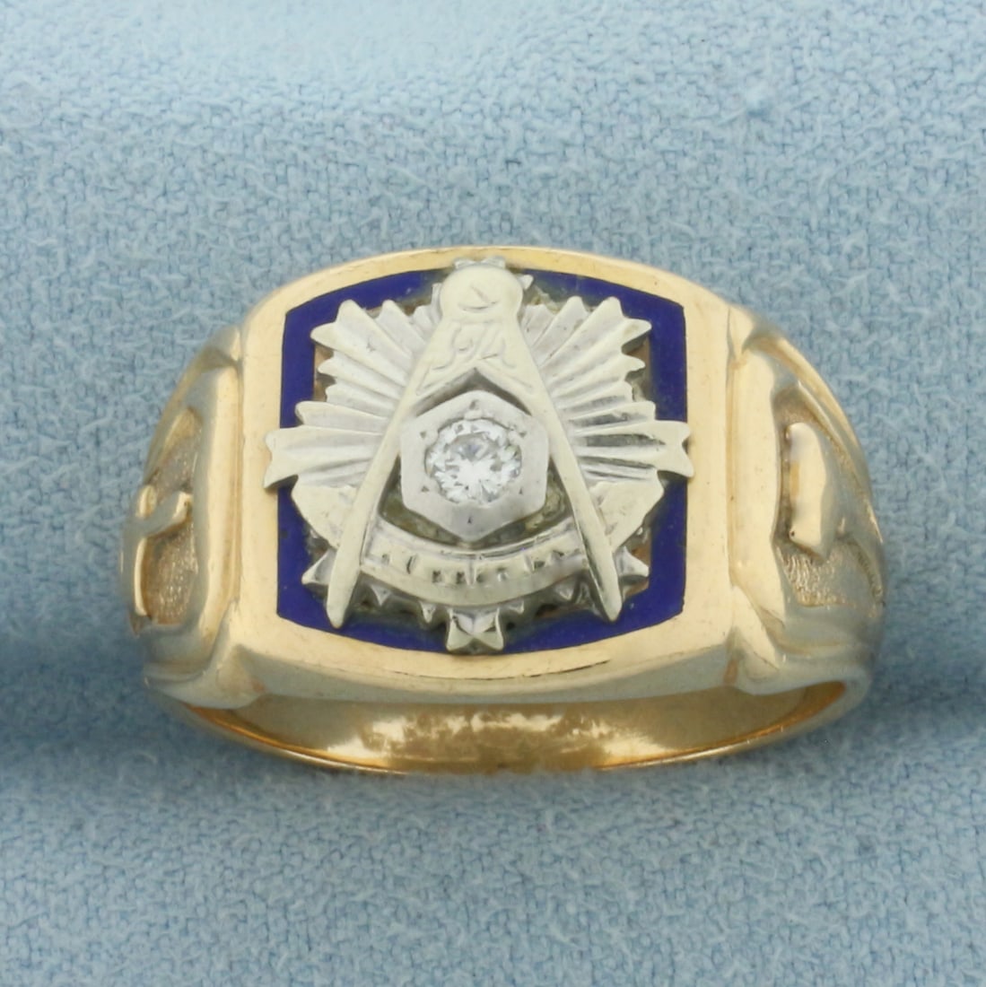 Vintage Diamond Masonic Ring in 14k Yellow Gold: In 14k Yellow Gold. Contains one .08ct high quality diamond, VS clarity/G color. 14.4mm wide at top of ring. Size 10. 14.0g.