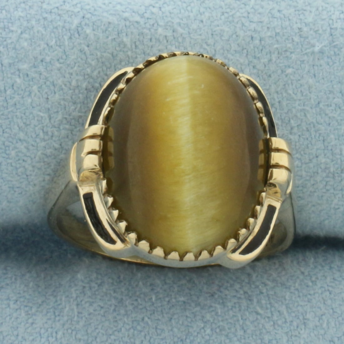 Tiger's Eye Ring in 14k Yellow Gold: In 14k Yellow Gold. Contains one 17x13mm high quality cabochon Tiger's Eye gemstone with very distinct "eye". Size 8. 5.5g.