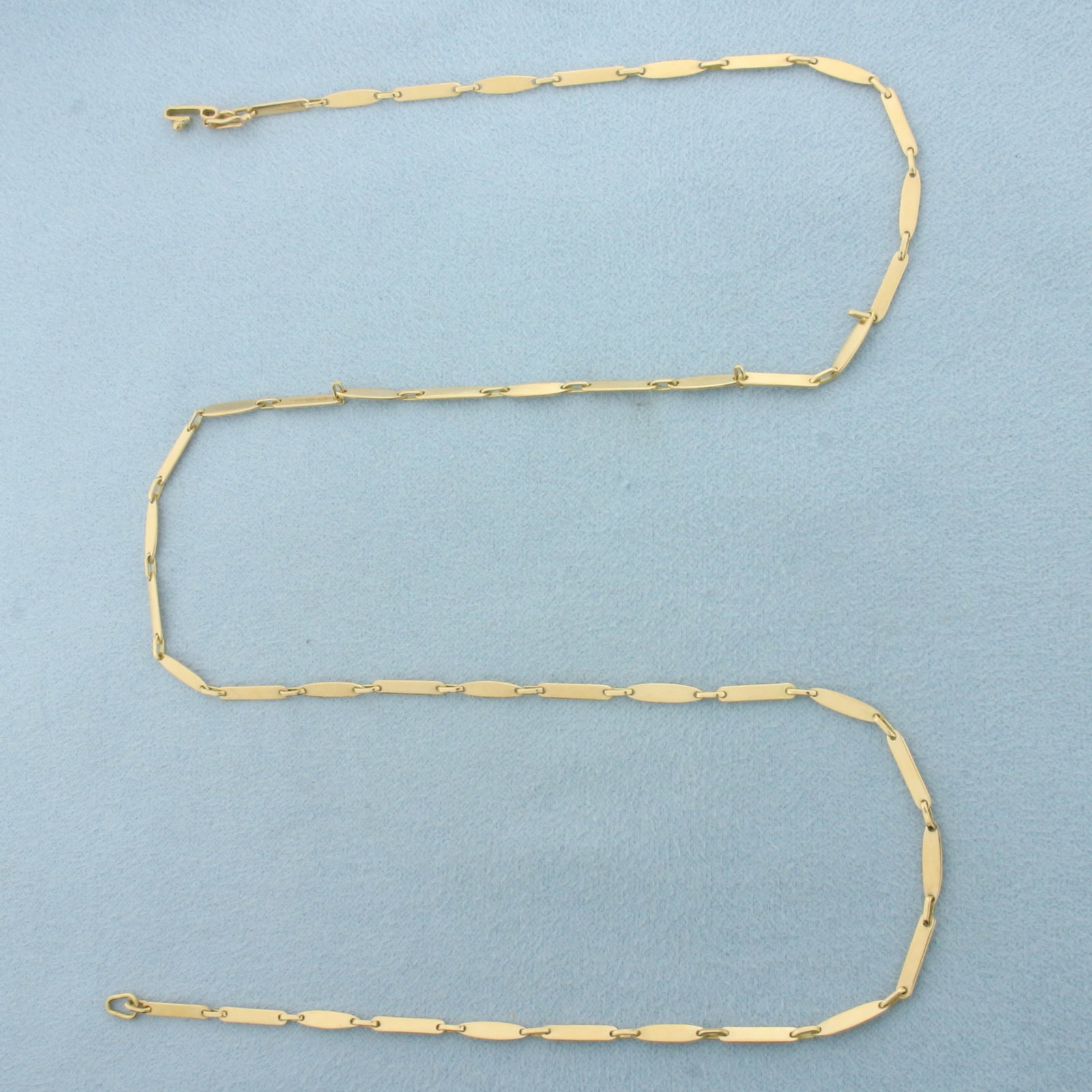 20 Inch Bar Link Necklace in 18k Yellow Gold: In 18k Yellow Gold. 20 inches long. 2.2mm wide. 6.1g.