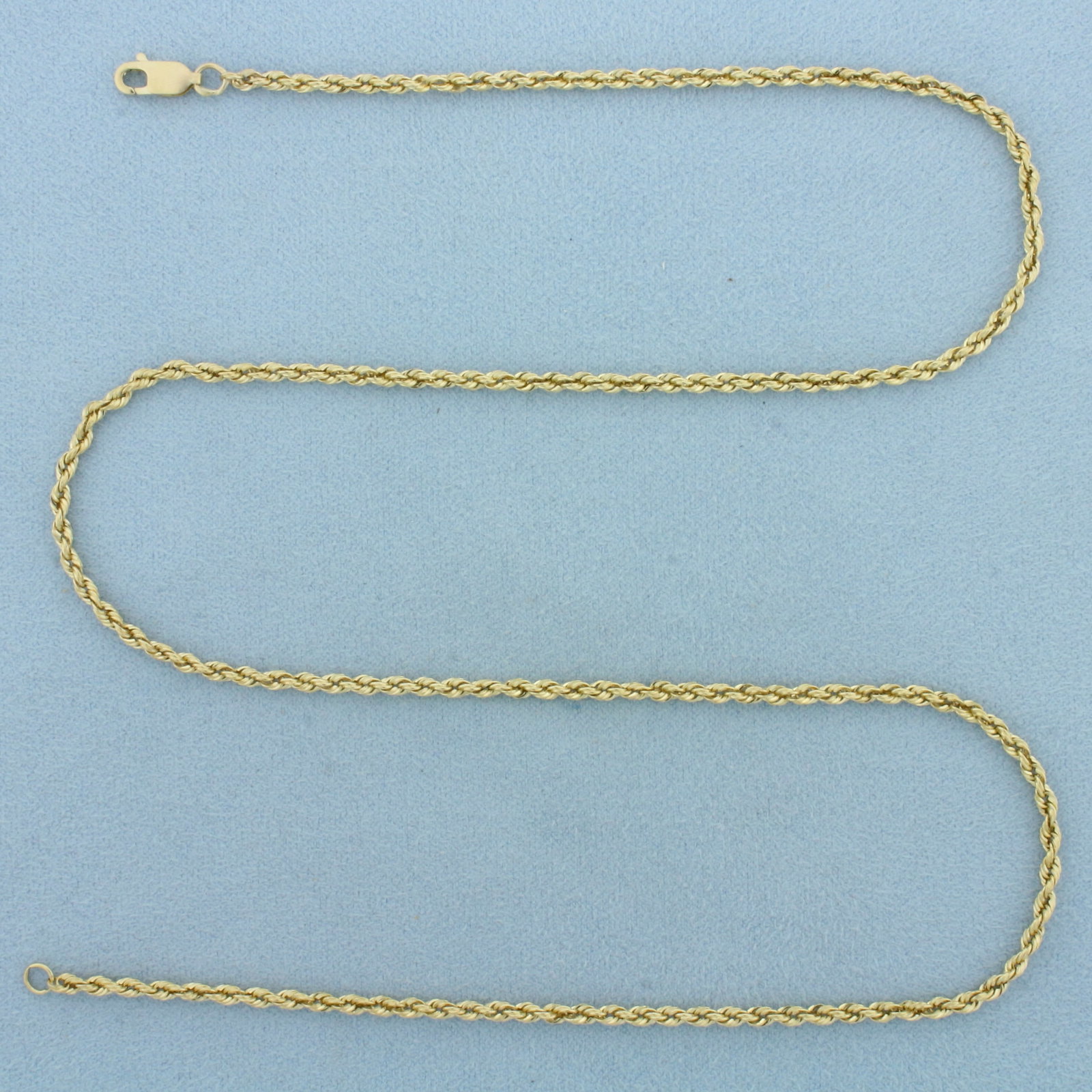 20 Inch Rope Link Chain Necklace in 14k Yellow Gold: In 14k Yellow Gold. 20 inches long. 2.3mm wide. Lobster clasp. 9.2g.