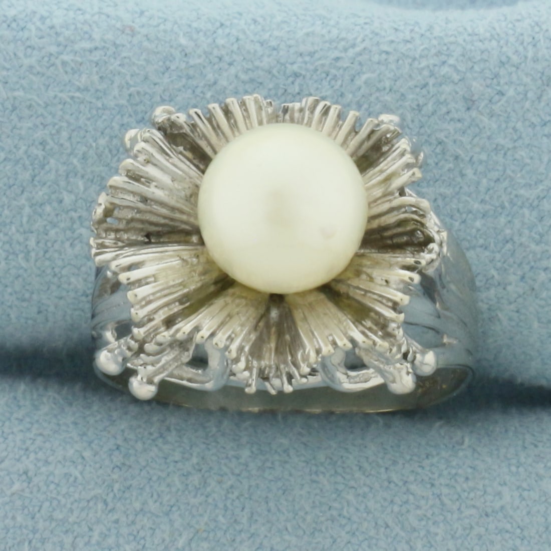 Vintage Cultured Akoya Pearl Ring in 14k White Gold: In 14k White Gold. Contains one 8.4mm high quality Cultured Akoya Pearl gemstone with high luster. 16mm wide across the top. Size 9.5. 6.5g.
