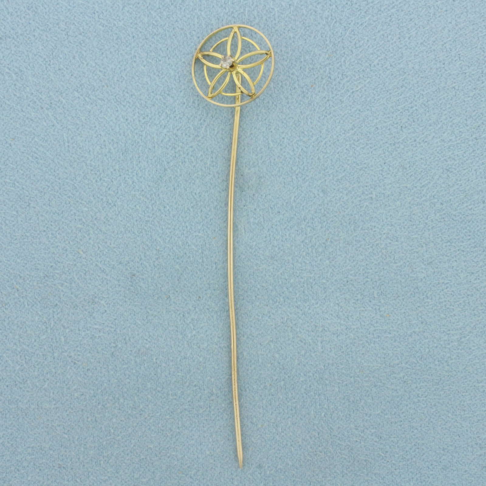 Antique Diamond Stick Pin in 10k Yellow Gold: In 10k Yellow Gold. Contains one .02ct high quality Old European cut diamond, VS clarity/G color. 2 3/4 inch long. 1/2 inch wide. .9g.