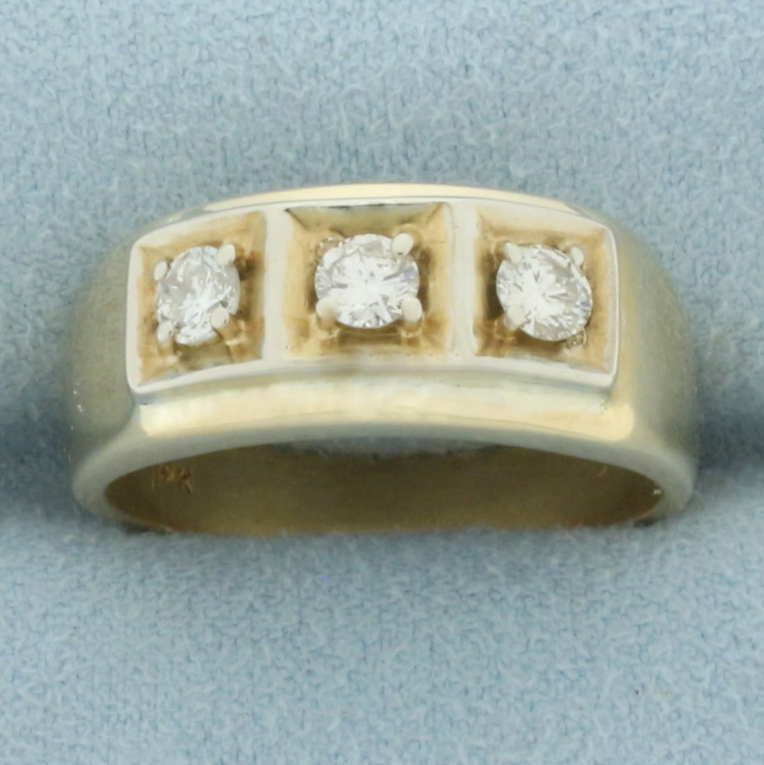 Mens Diamond Three Stone Diamond Wedding or Anniversary Ring in 14k Yellow Gold: In 14k yellow gold. Contains three round brilliant diamonds, .6ct TW, VS clarity/H color. Approx. 9mm at widest point on top. Size 11. 10.3g.