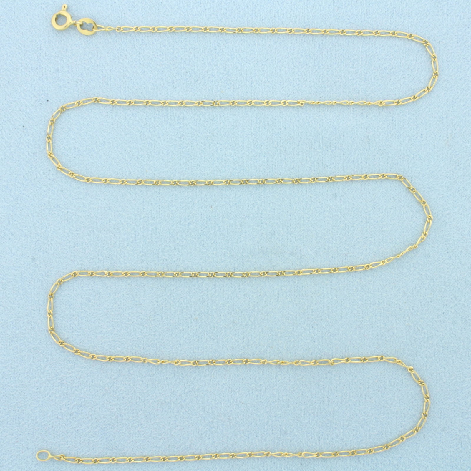24 Inch Elongated Cable Link Chain Necklace in 18k Yellow Gold: In 18k Yellow Gold. 24 inches long. 1.5mm wide. Italian made. Spring clasp. 3.6g.