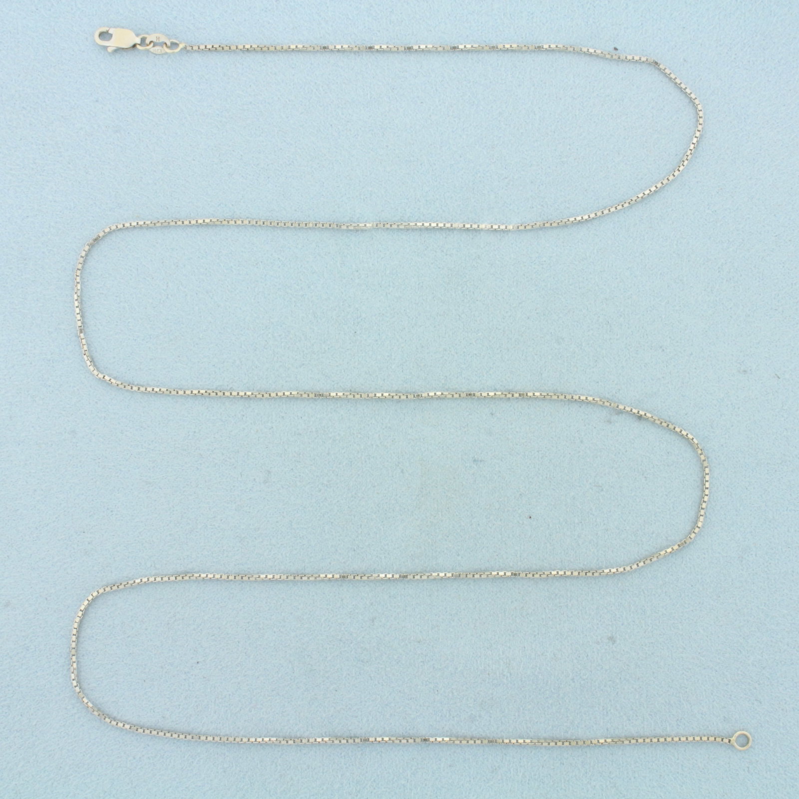 24 Inch Box Link Chain Necklace in 14k White Gold: In 14k White Gold. 24 inches long. 1mm wide. Lobster clasp. 3.9g.
