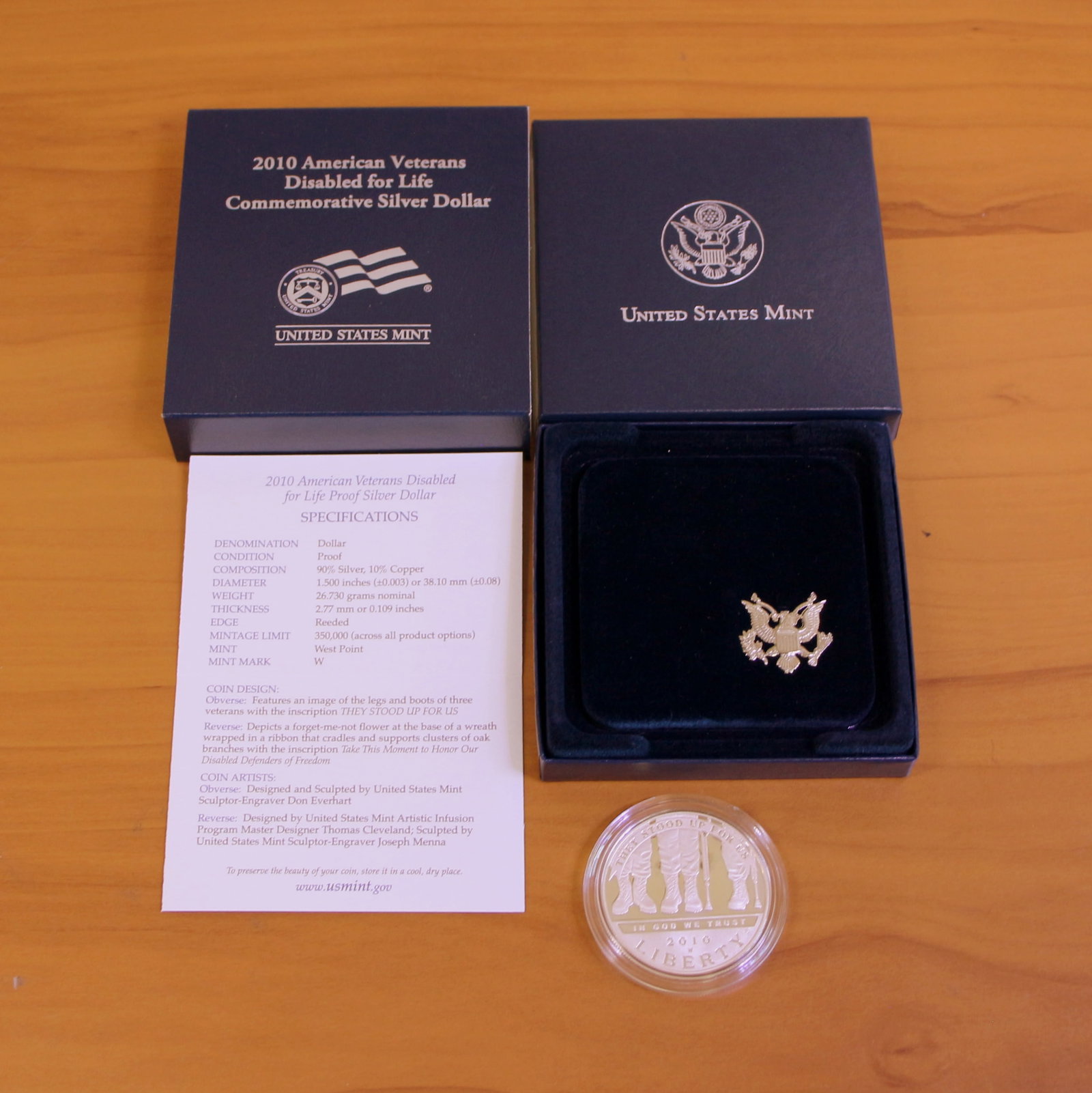 US Mint American Veterans Disabled for Life Commemorative Silver Dollar Coin OGP: Contains one 2010 90% Silver American Veterans Disabled for Life Commemorative Silver Dollar. Set in original government packaging and contains certificate of authenticity.