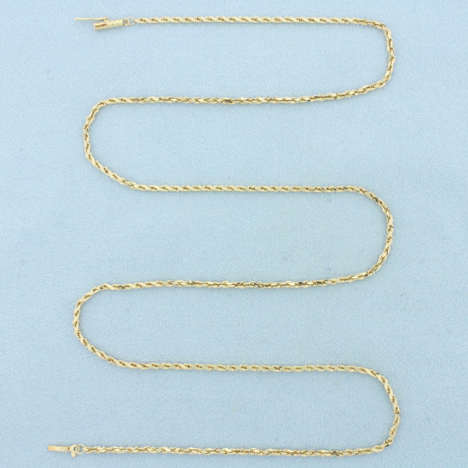 Mens 24 Inch Rope Link Chain Necklace in 14k Yellow Gold: In 14k Yellow Gold. 24 inches long. 1.7mm wide. Barrel clasp with safety latch. 8.2g.