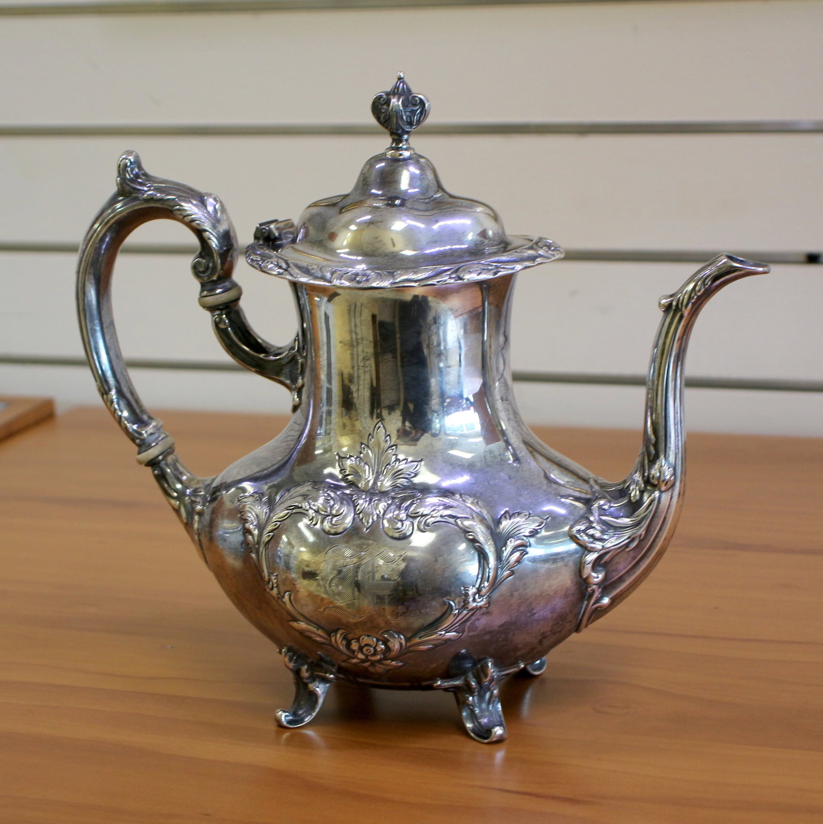 Vintage Reed and Barton "Burgundy" Sterling Silver Teapot: In .925 Sterling Silver. 9 1/2 inches tall. 11 inches wide. #745. Monogrammed "F" on one side. Great overall condition, no defects. 1,025g.