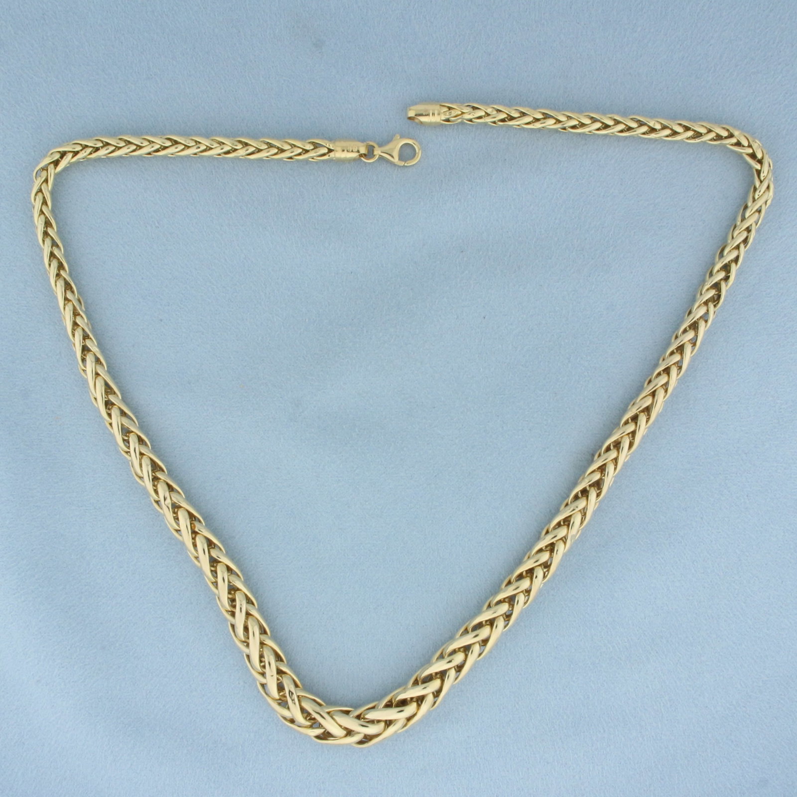 18 Inch Italian Graduated Wheat Link Chain Necklace in 14k Yellow Gold: In 14k Yellow Gold. 18 inches long. 3.7 to 6.6mm wide. Italian made. Lobster clasp. 12.5g.