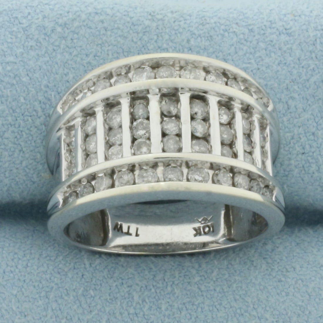 Bar Set Diamond Ring in 10k White Gold: In 10k White Gold. Contains forty-nine high quality diamonds, 1ct TW. 13.2mm wide at top of ring. Size 7.5. 5.8g.