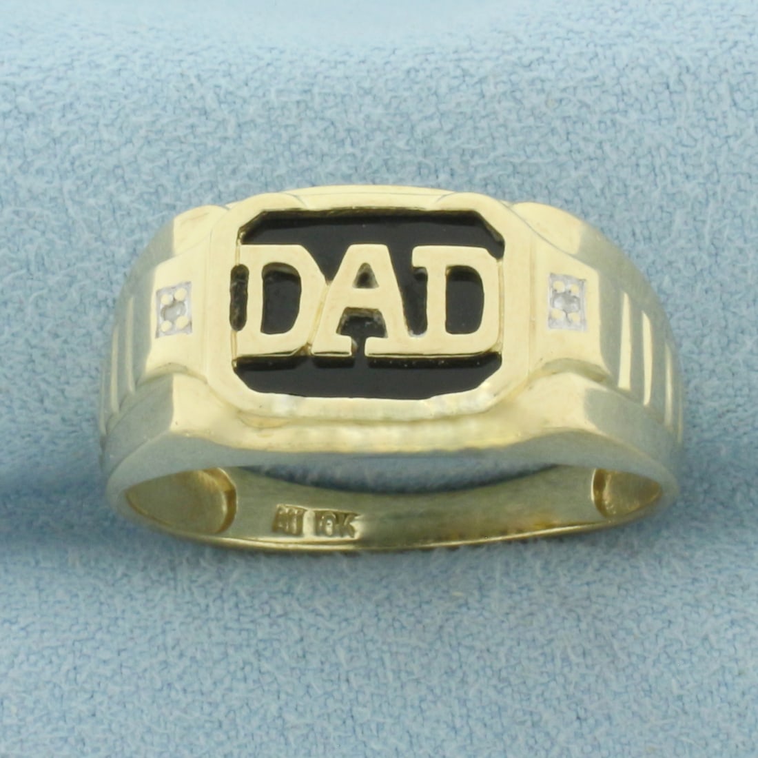 DAD Onyx and Diamond Ring in 10K Yellow Gold: In 10k Yellow Gold. 11mm wide at top of ring. 12mm Onyx plaque. Also contains two high quality 1/2pt diamonds. Size 11. 3.9g.