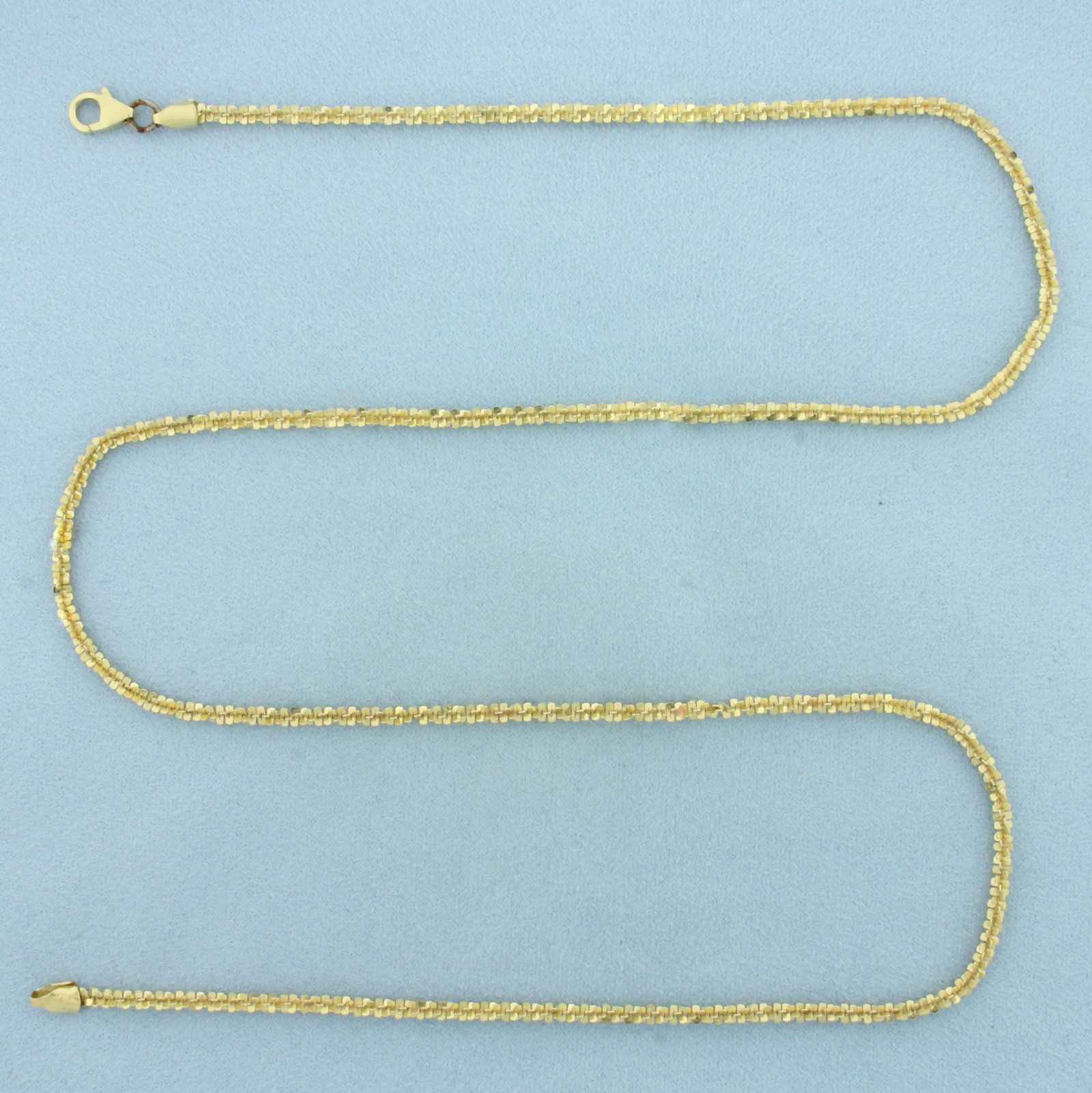 25 Inch Italian Sparkle Link Chain Necklace in 14k Yellow Gold: In 14k Yellow Gold. 25 inches long. 2.8mm wide. Italian made. Lobster clasp. 9.9g.