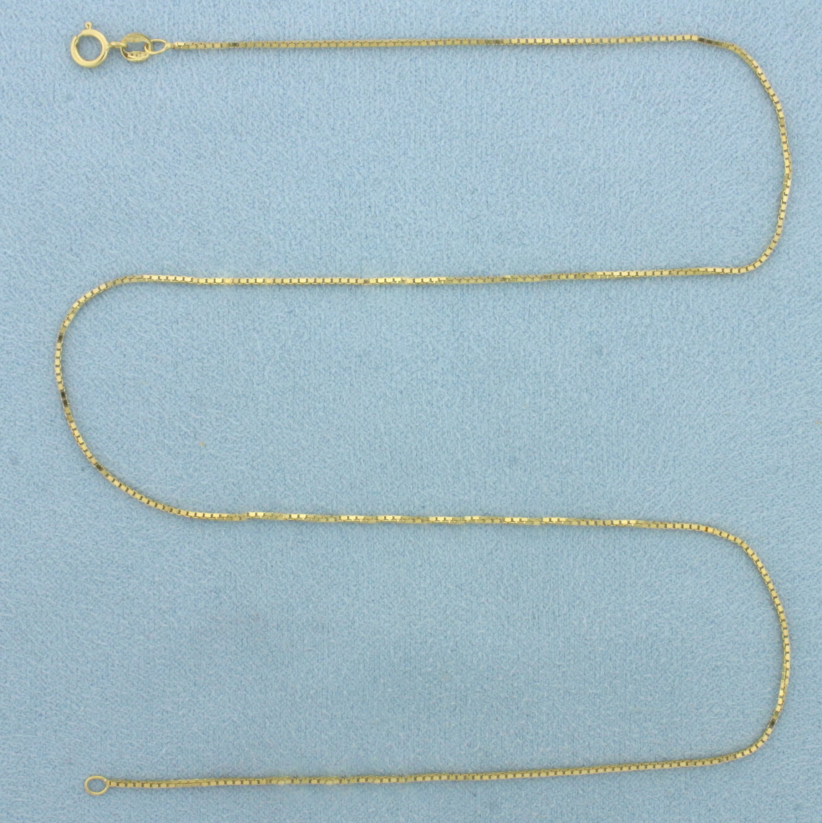 16 Inch Italian Box Link Chain Necklace in 14k Yellow Gold: In 14k Yellow Gold. 16 inches long. 0.7mm wide. Italian made. Spring clasp. 1.7g.