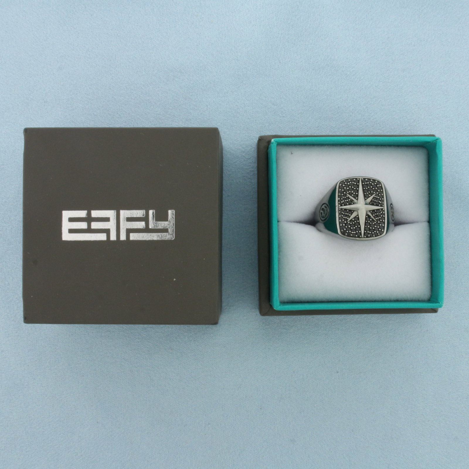 Effy Mens Spinel Star Ring in Sterling Silver: In.925 Sterling Silver. Accented with high quality Black Spinel gemstones. 19mm wide at top of ring. Original box included. Size 10.