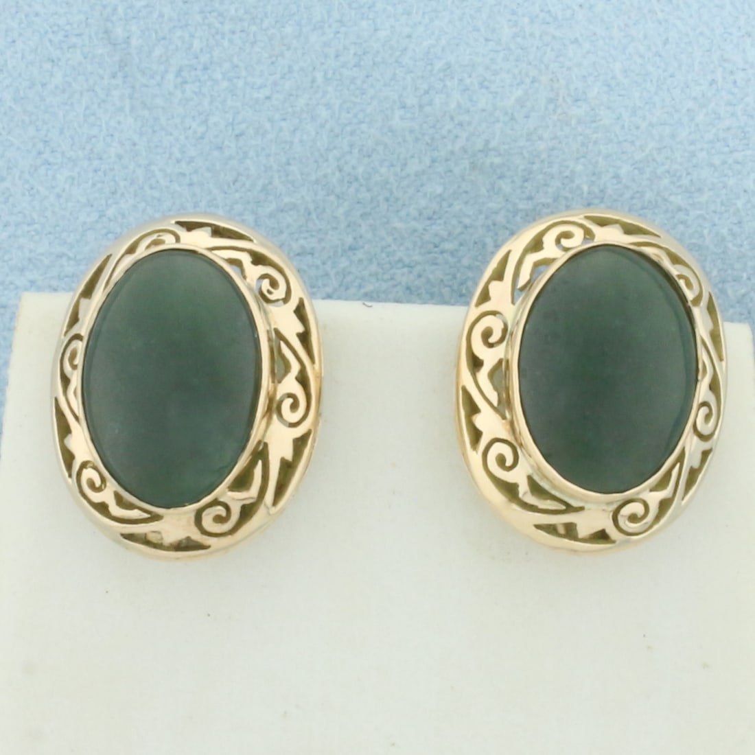 Vintage Jade Screw Back Non Pierced Ears Filigree Earrings in 14k Yellow Gold: In 14k Yellow Gold. Contains two high quality natural 13x10mm Jade gemstones with deep blue color and excellent clarity. Pressure screw back closure, for non-pierced ears. 7.1g.